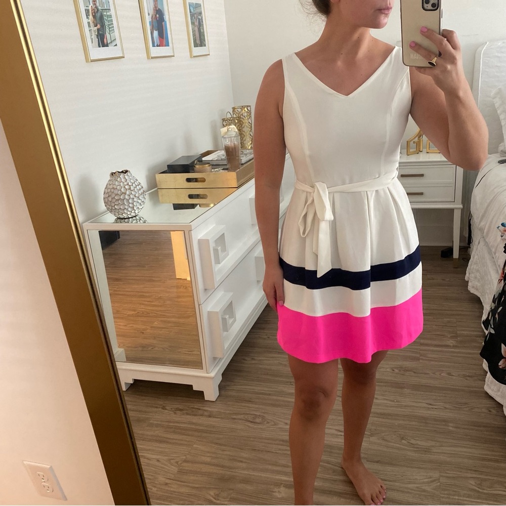 White sleeveless A-line dress with tie waist and navy and pink stripe